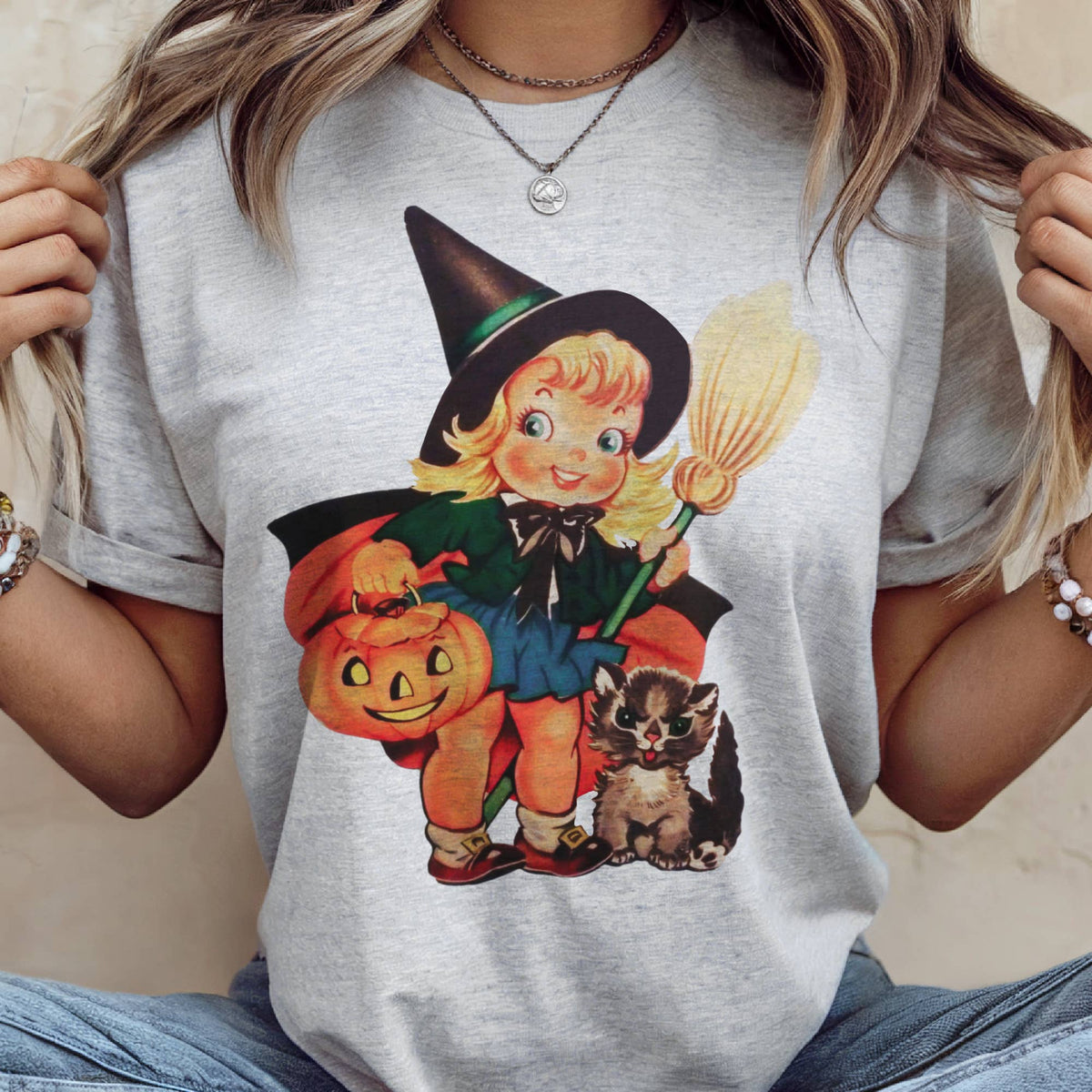 grey tee with witch
