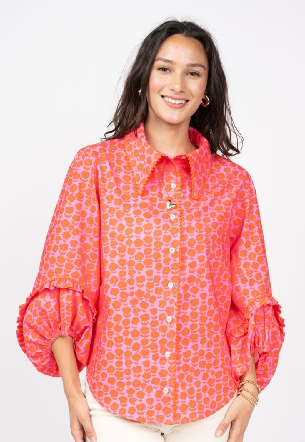pink and orange daisy pattern top