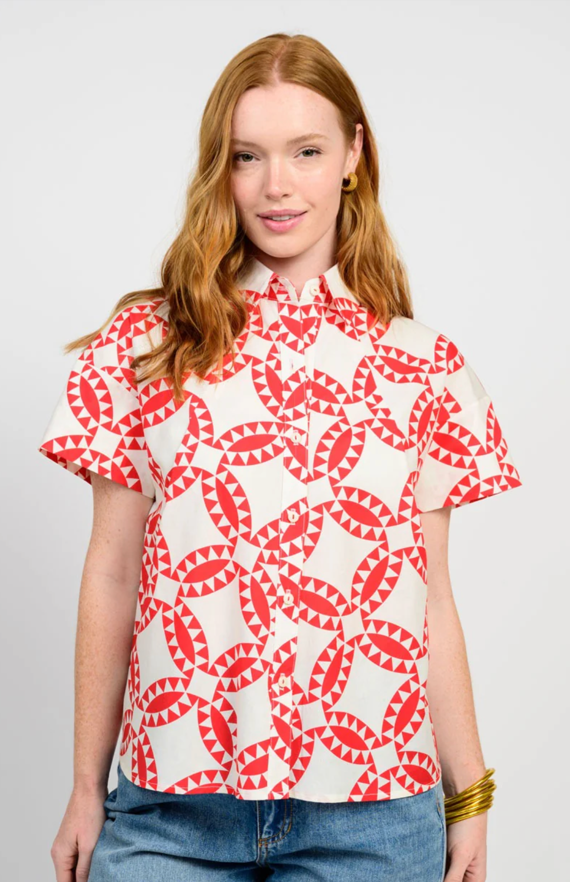 red and white geometric pattern top