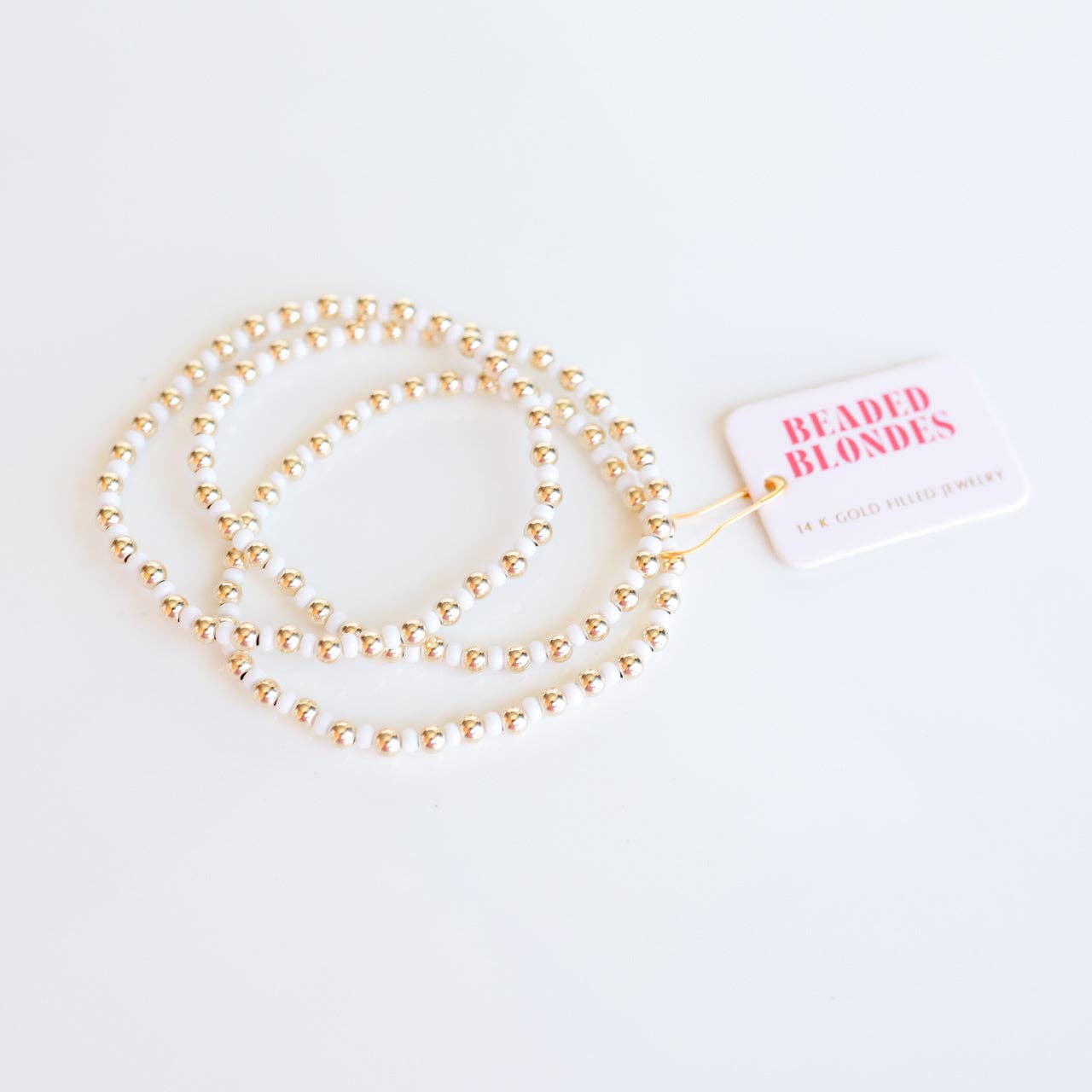 Demi in White Bracelet