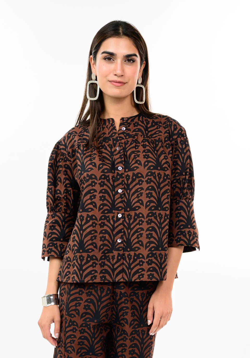 brown and black button down top