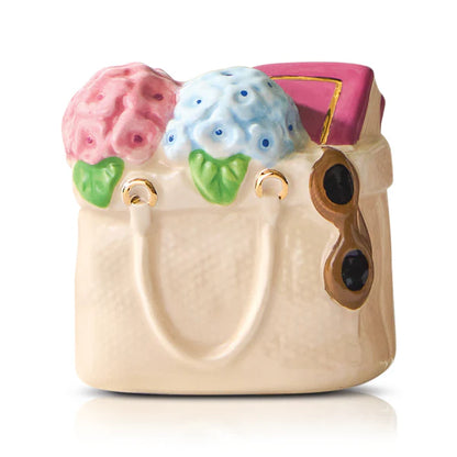 Nora Fleming tote with hydrangeas and sunglasses 