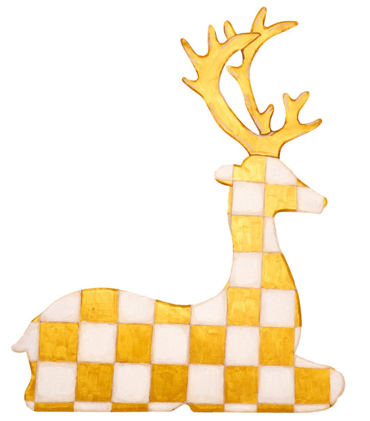 resting gold checked deer