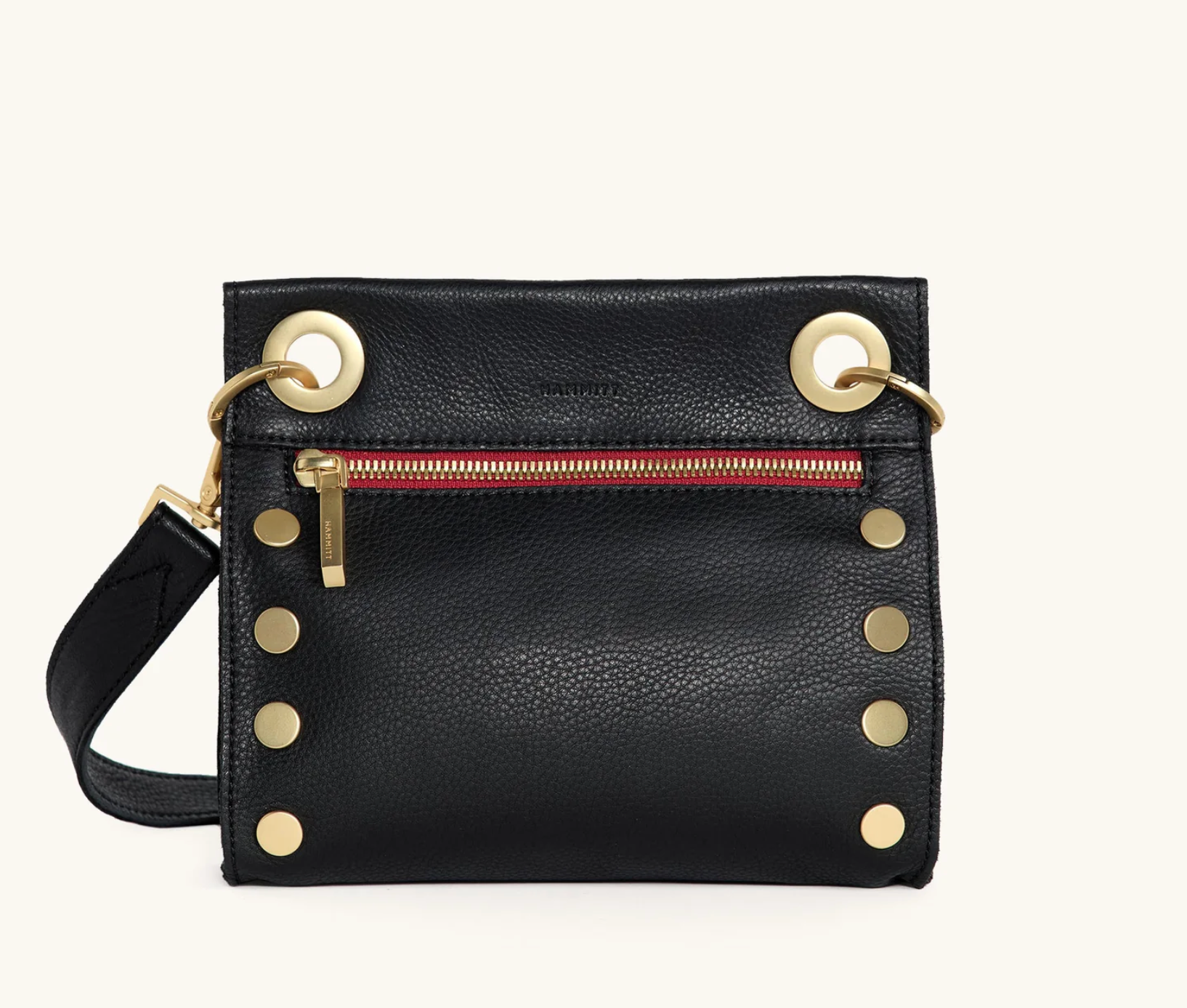 Crossbody black leather bag with red zipper and gold hardware