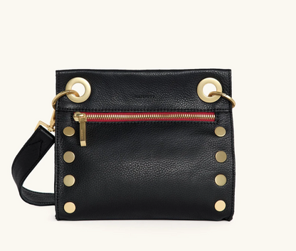 Crossbody black leather bag with red zipper and gold hardware