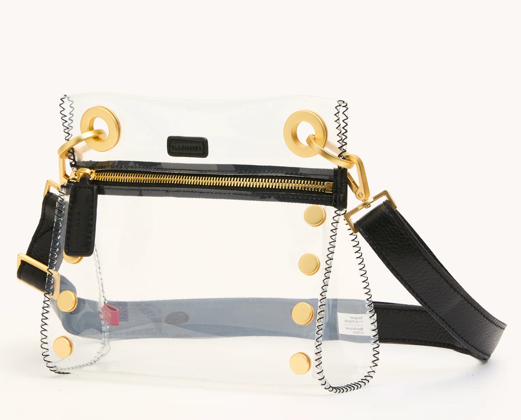 clear crossbody with black zipper and gold hardware