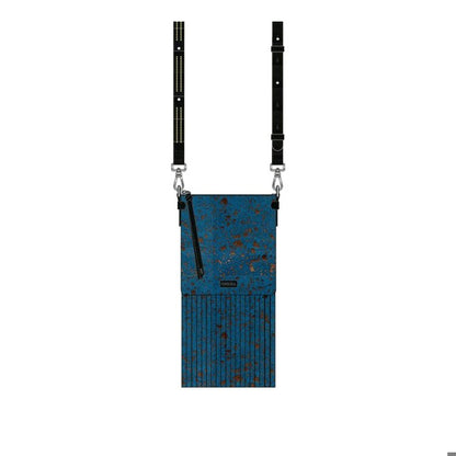 blue crossbody with brown flecks and fringe 