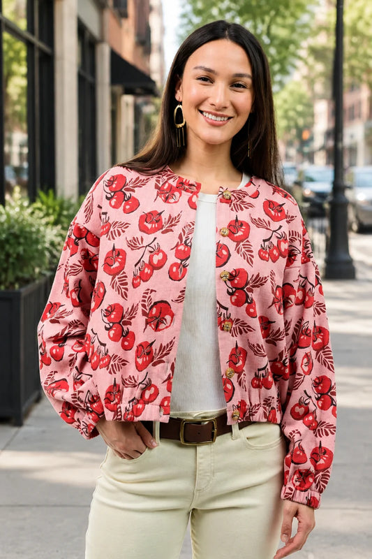 pink jacket with tomatoes