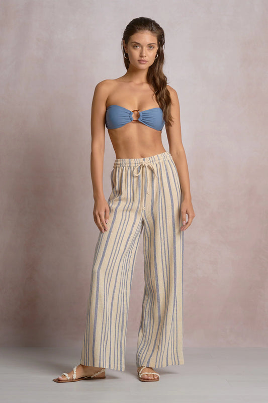 beige drawstring pants with blue stripe 
