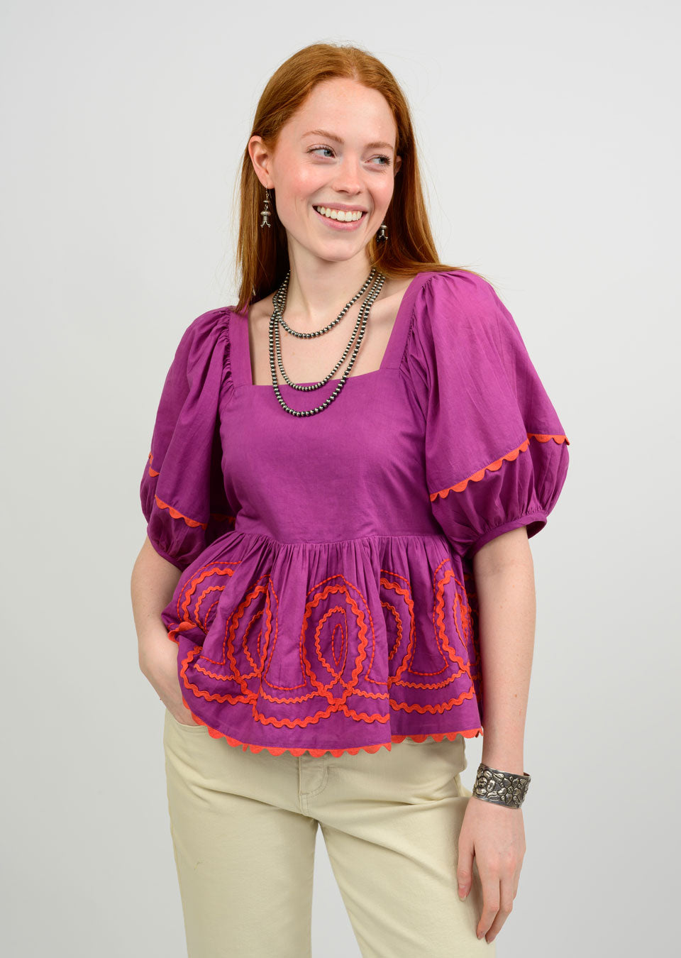 SM TOP LOOPY PEPLUM